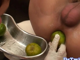 Close up of an Asian twink getting his prostate stimulated with a big dildo