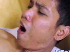 A naked doctor has hot sex with an Asian twink.