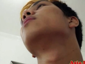 Close up of an Asian man getting his ass fucked without a condom.