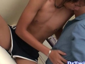 Hot doctor from an Asian background gives a blow job to a patient.
