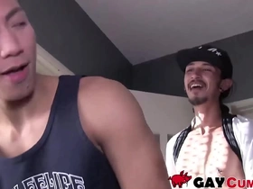 Skinny Asian man gives blow job to a big cock without any hesitation.