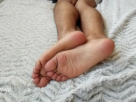 Young man shows off his sexy feet for your viewing pleasure