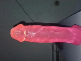Solitary playtime with a massive hot pink anal toy