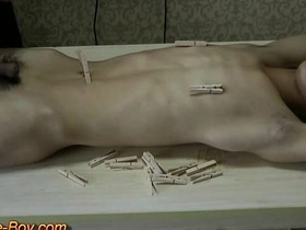 Tiny Asian boy endures painful BDSM slave play