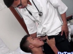 Young Asian guy gives a blowjob to his doctor